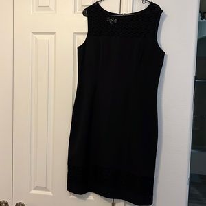 Women’s knee length size 14 Kasper black dress with back zipper and added detail
